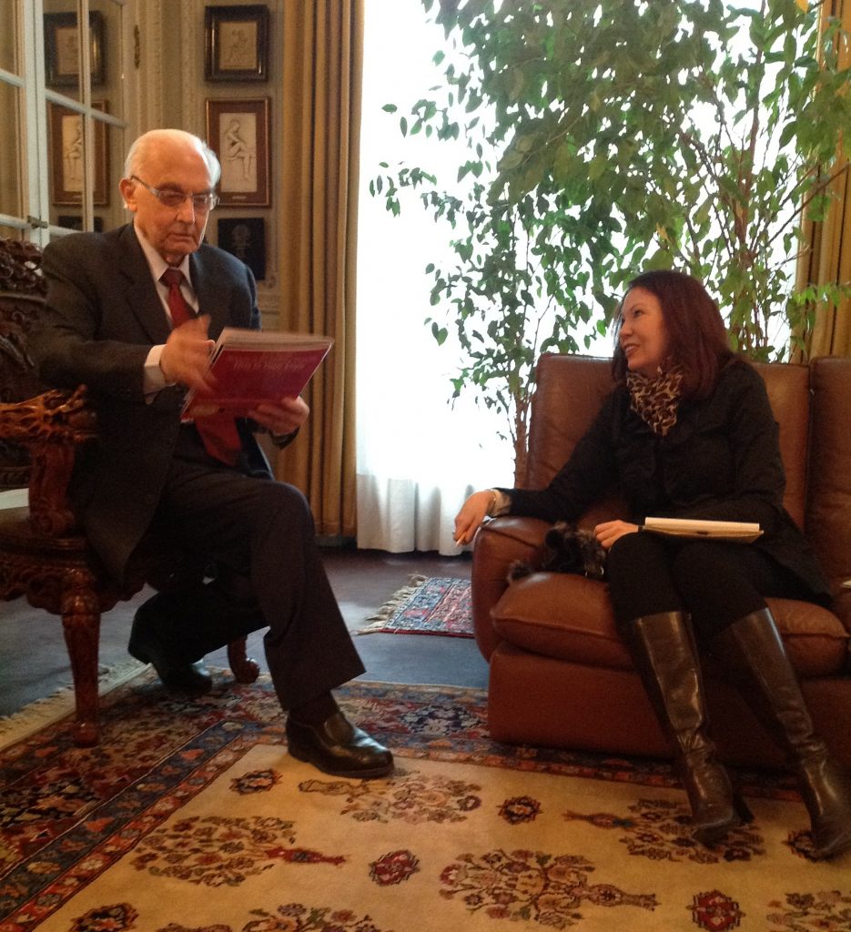 Angela O'Mara interviewing world-renowned plastic surgeon Dr. Pierre Fournier at his home in Paris, France.